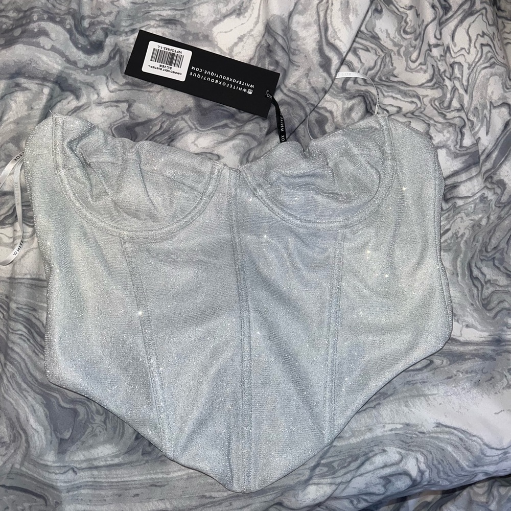 White fox boutique silver glitter corset never worn.